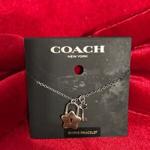 Coach Silver Star Lock slider Bracelet
